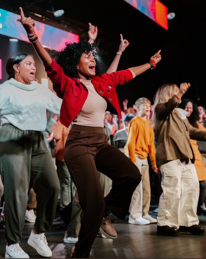 Worshipper dancing during the concert